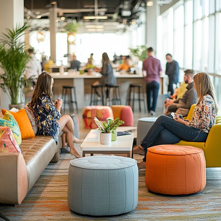 Open-plan office with designated activity zones and collaborative seating areas